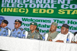 INEC Chairman, Mahmood Yakubu and IGP Kayode Egbetokun during a stakeholders meeting Benin