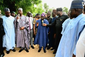 President Bola Tinubu during a visit to an Internally Displaced Persons camp at Government Secondary School in Maiduguri on Monday