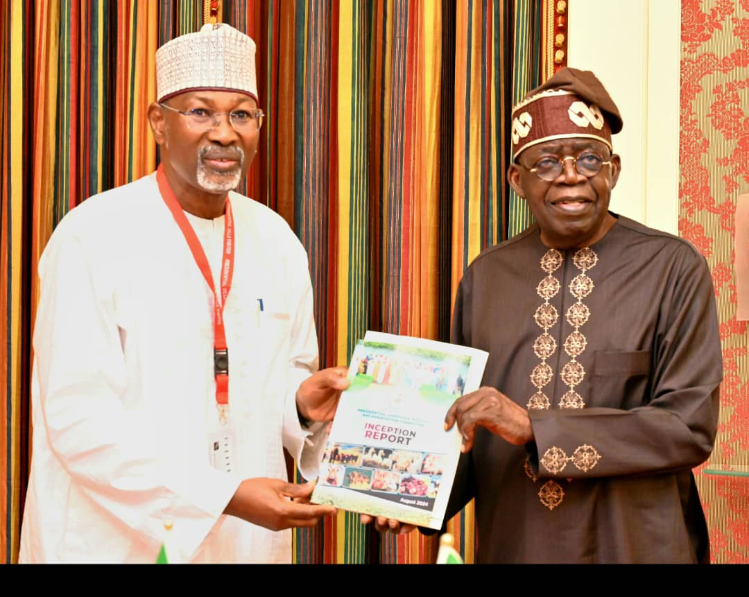 Prof. Attahiru Jega, Chairman, Presidential Committee on Implementation of Livestock Reforms, presenting the committee’s report to President Bola Tinubu at the Presidential Villa on Thursdayi