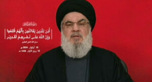 An image grab taken from Hezbollah’s Al-Manar TV shows the Lebanese militant group’s chief Hassan Nasrallah addressing the nation from an undisclosed location on September 19, 2024. (Photo by Al-Manar / AFP)