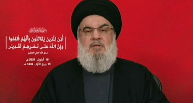 An image grab taken from Hezbollah’s Al-Manar TV shows the Lebanese militant group’s chief Hassan Nasrallah addressing the nation from an undisclosed location on September 19, 2024. (Photo by Al-Manar / AFP)