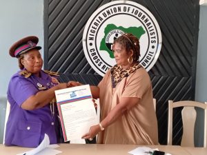 Comrade Archibong Bassey NUJ Chairman Cross River State Council and Dr Mercy Efiom during a Courtesy visit At Ernest Etim Bassey Press Centre
