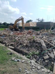 Part of the demolished structures and rice farm in Makurdi