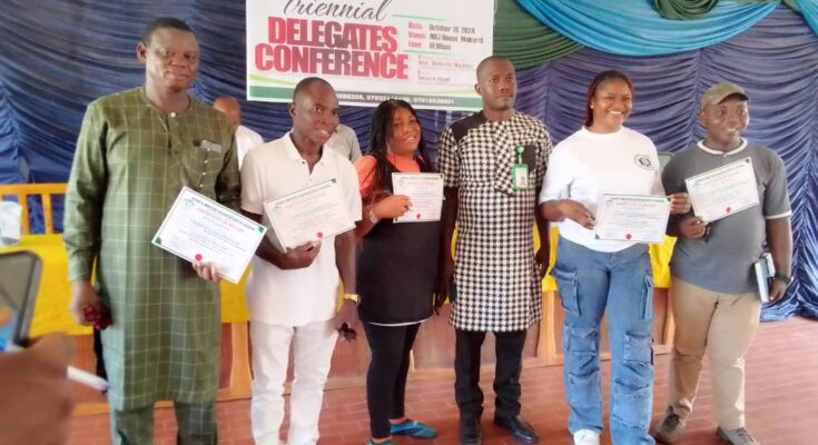 Benue SWAN chairman, Ms Hembadoon Orsar (middle) and other elected officials