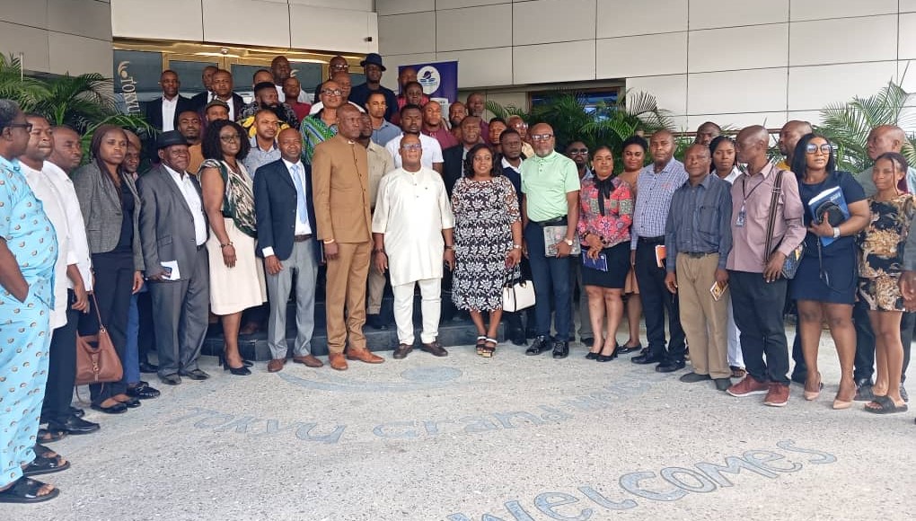 Rivers state Commissioner for Culture and Tourism Dr Israel Ngbuelo m flanked by hotel and restaurant owners during a stakeholder meeting in Port Harcourt on Thursday