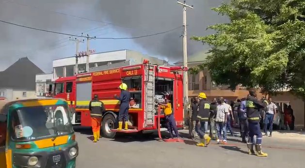 PHOTONEWS: Fire guts Eco Fitness Hub in Gwarinpa, Abuja 3 Fire fighters at the scene of the fire outbreak