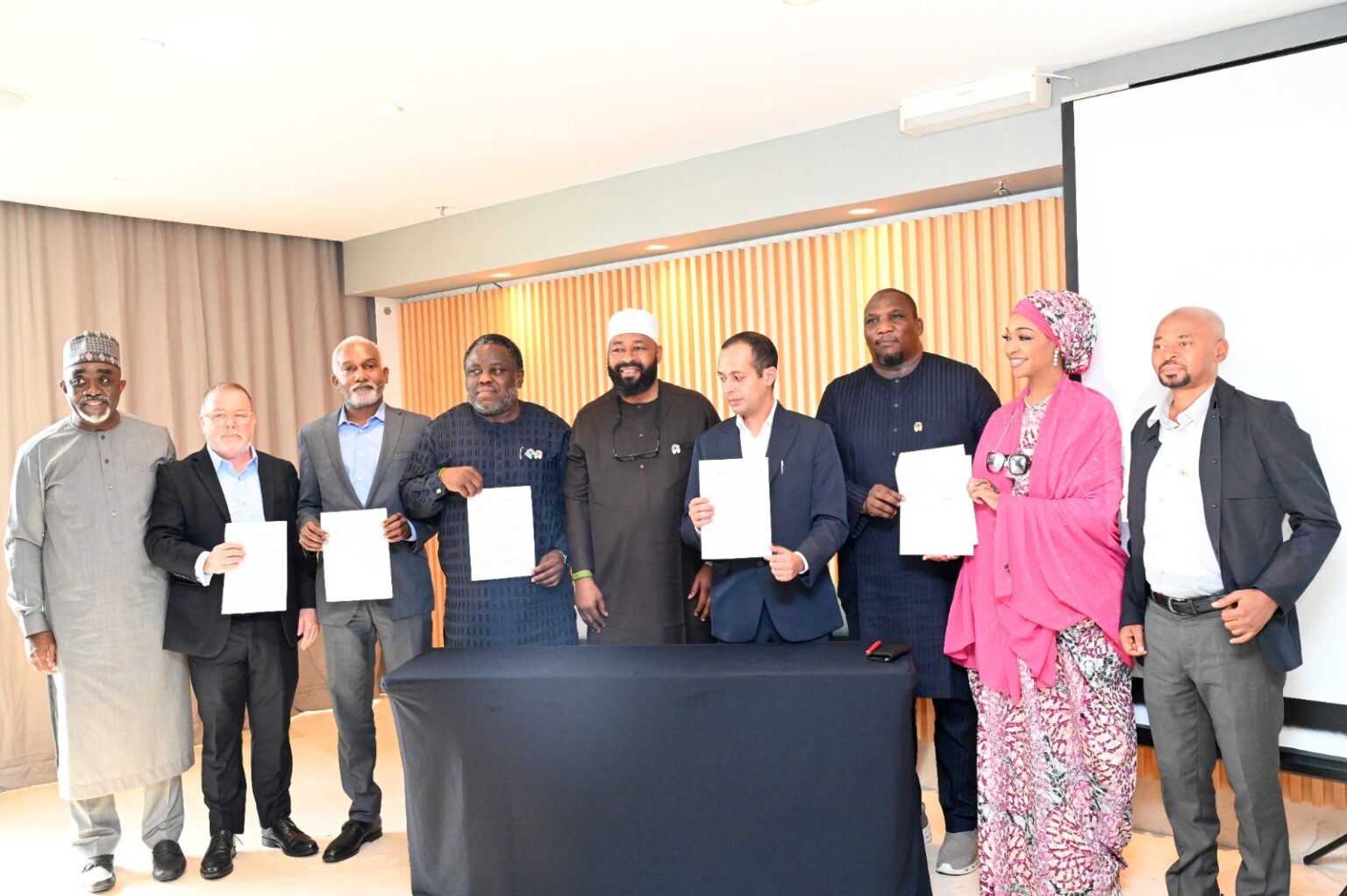Gov. Muhammed Bago of Niger, Amb. Yusuf Tuggar, Minister of Foreign Affairs, officials of Niger Foods and Uttam Sucrotech International Ltd., after signing the $5 billion MoU on Nov. 20 in Rio de Janeiro, Brazil.