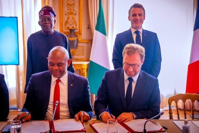 President Bola Tinubu and Emmanuel Marcon