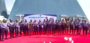 Chief of Naval Staff CNS Vice Admiral Emmanuel Ogalla raising a flag to mark the commencement of the 2024 CNS Annual Sea Inspection 1536x733 1