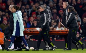Arsenal’s Brazilian striker #09 Gabriel Jesus is stretchered off injured during the English FA Cup third-round football match between Arsenal and Manchester United at the Emirates Stadium in London on January 12, 2025. (Photo by Ian Kington / IKIMAGES / AFP)