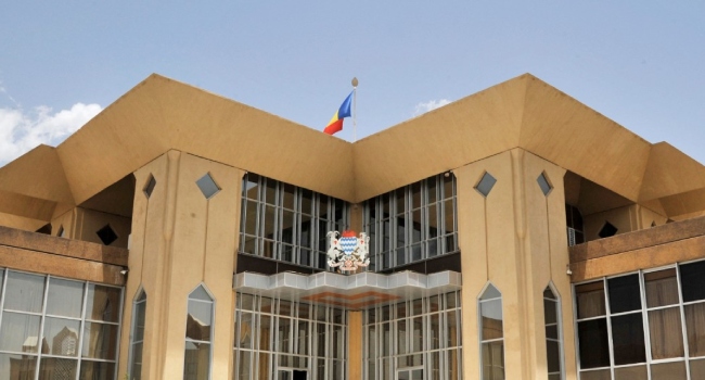 (FILES) A picture taken on June 18, 2013, shows a view of the Presidential Palace with the coat of arms in the Chadian capital N’djamena. (Photo by Issouf SANOGO / AFP).