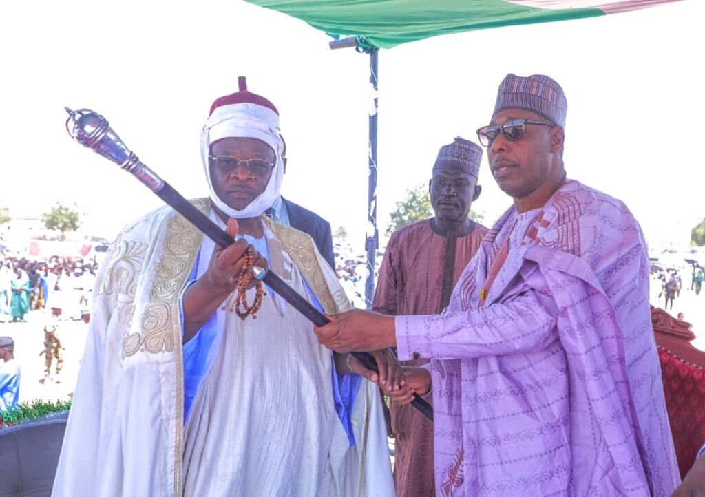 Zulum presents staff of office to the Shehu of