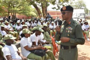 Director-General of the National Youth Service Corps (NYSC), Brig.-Gen. Olakunle Nafiu, addressing corps member in camp