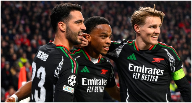 Arsenal’s Dutch defender #12 Jurrien Timber (C) celebrates scoring his team’s first goal during the UEFA Champions League round of 16 first leg football match between PSV Eindhoven (NED) and Arsenal FC (ENG) at the the PSV Stadion, in Eindhoven, on March 4, 2025. (Photo by JOHN THYS / AFP)