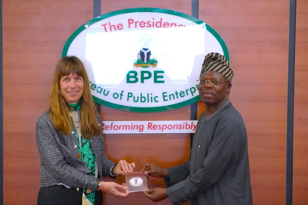 The Director-General Bureau of Public Enterprises (BPE), Mr. Ayodeji Gbeleyi (right) presents a plaque to the Managing Director of the European Bank for Reconstruction and Development, Dr. Heike Harmgart during her courtesy visit to the Bureau... Thursday.