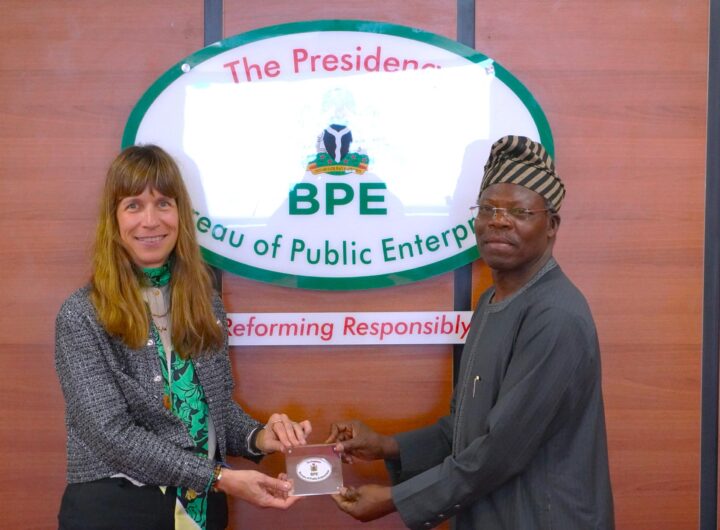 The Director-General Bureau of Public Enterprises (BPE), Mr. Ayodeji Gbeleyi (right) presents a plaque to the Managing Director of the European Bank for Reconstruction and Development, Dr. Heike Harmgart during her courtesy visit to the Bureau... Thursday.