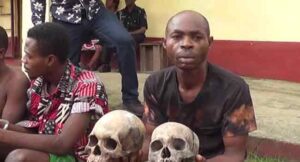 Arrested ritualists with human skulls