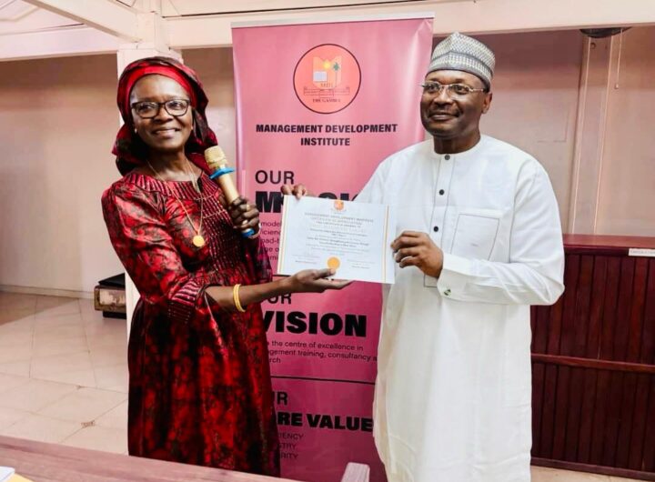 Professor Yakubu being honoured by the Civil Service University in Banjul, The Gambia, after delivering the lecture.
