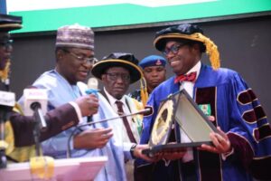 L-R: Former Bauchi State Governor, Isa Yuguda; Prof. Olufemi Peters, Vice-Chancellor, National Open University of Nigeria and Prof. Akinwumi Adesina, President, African Development Bank (AfDB), during the 14th convocation lecture of NOUN