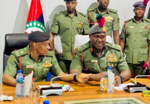 The outgone Commandant NDA Maj-Gen John Ochai, and the new NDA Commandant Maj-Gen. Abdul Ibrahim