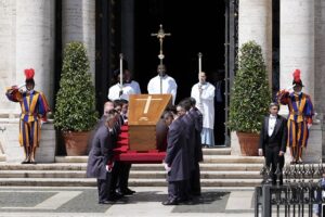 The coffin of late Pope Francis is carried by pallbearers into Santa Maria Maggiore Basilica, in Rome on April 26, 2025. (Photo by Stefano Costantino / AFP)