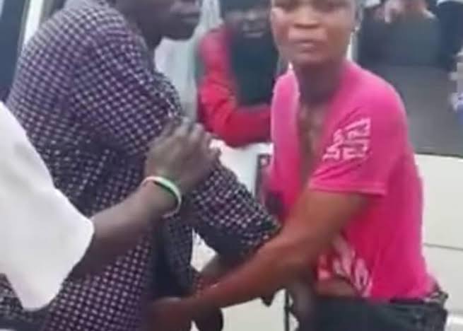 Police detain man seen assaulting woman in viral video