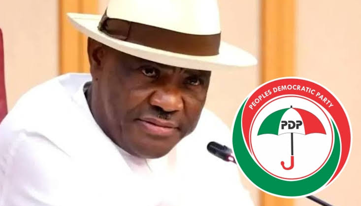 FCT Minister, Nyesom Wike and PDP logo