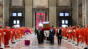 The coffin of late Pope Francis is carried by pallbearers into Santa Maria Maggiore Basilica, in Rome on April 26, 2025. (Photo by Stefano Costantino / AFP)