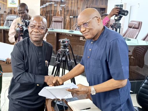 Abia State Governor, Alex Otti and INEC’s Acting Chairman, Mr. Sam Olumekun
