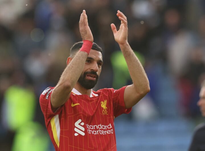 Liverpool’s Egyptian striker #11 Mohamed Salah applauds on the pitch after the English Premier League football match between Leicester City and Liverpool at King Power Stadium in Leicester, central England on April 20, 2025. (Photo by Darren Staples / AFP)