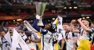 Defender lifts trophy