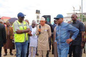 FCT Minister Nyesom Wike (right) during inspection of dualisation of Ushafa road in Bwari Area Council on Saturday.