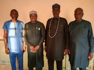 Director of Research and Publication at the Benue Public Service Institute (BPSI) Makurdi, Dr. Mark Nyitse (2nd left) and the leaders of his community
