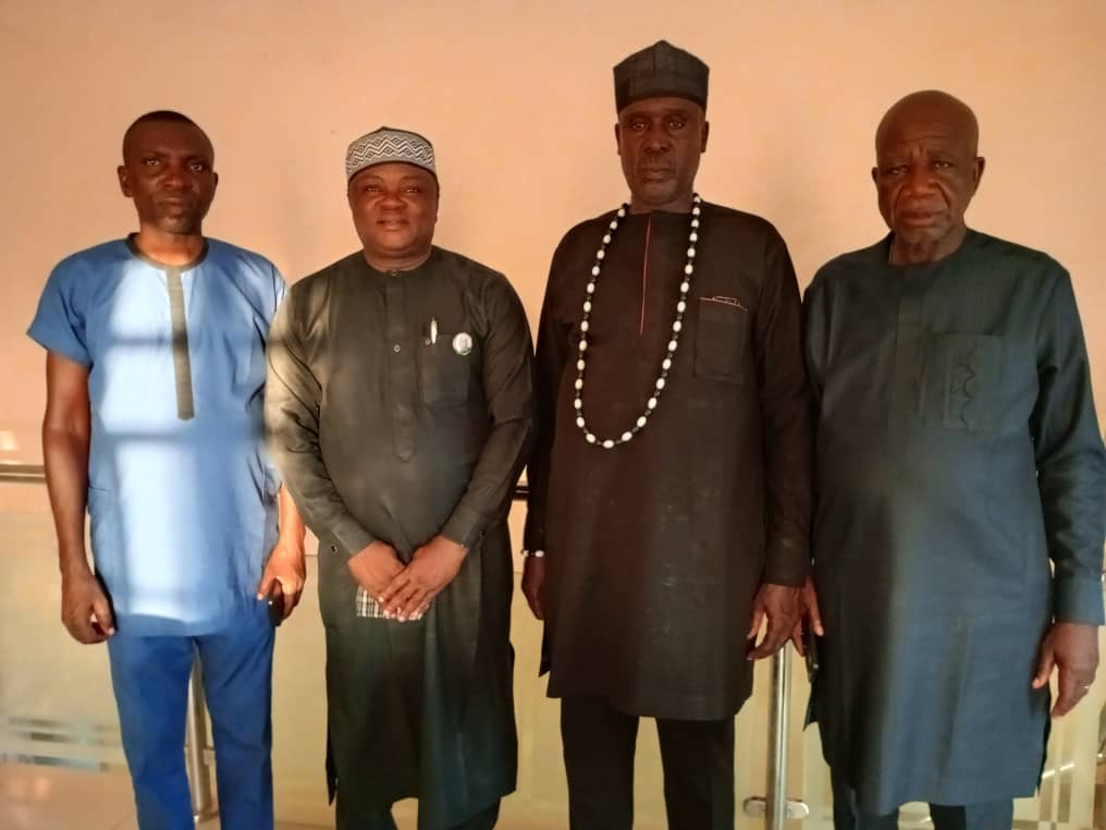 Director of Research and Publication at the Benue Public Service Institute (BPSI) Makurdi, Dr. Mark Nyitse (2nd left) and the leaders of his community
