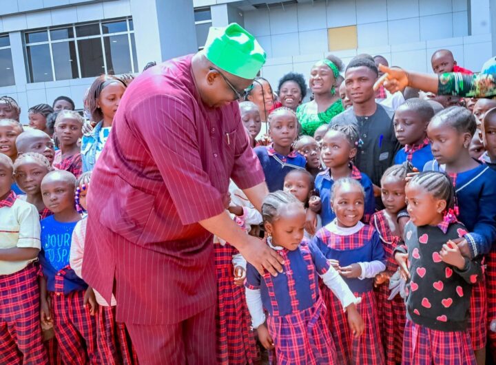 Plateau State Governor, Caleb Mutfwang in the midst of school children