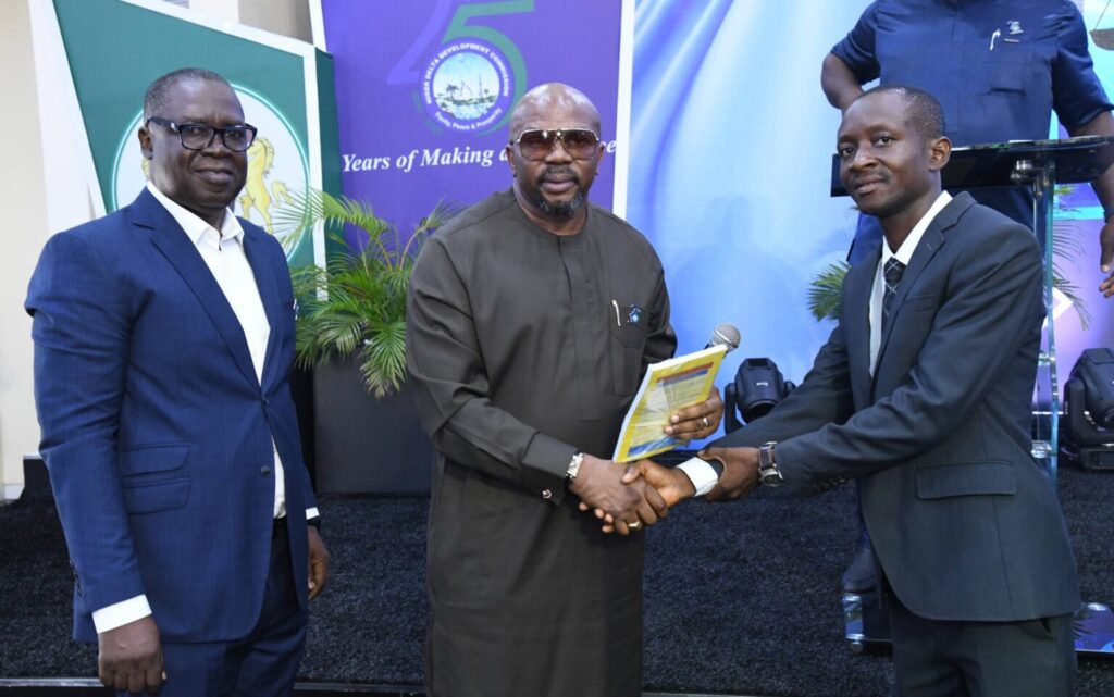 Here is the text without hyphen marks: L-R NDDCs Acting Director of Legal Services Victor Arenyeka NDDC Executive Director of Finance and Administration Boma Iyaye presenting Law Report