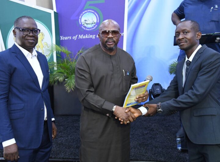 Here is the text without hyphen marks: L-R NDDCs Acting Director of Legal Services Victor Arenyeka NDDC Executive Director of Finance and Administration Boma Iyaye presenting Law Report