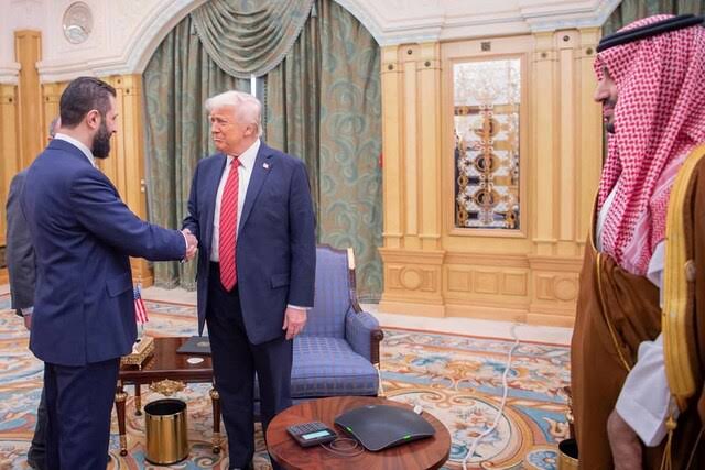 In this photo released by the Saudi Royal Palace, Syria’s interim President Ahmad al-Sharaa, left, shakes hands with President Donald Trump, centre, in Riyadh, Saudi Arabia, Wednesday, May 14, 2025. At right is Saudi Crown Prince Mohammed bin Salman.(Bandar Aljaloud/Saudi Royal Palace via AP)