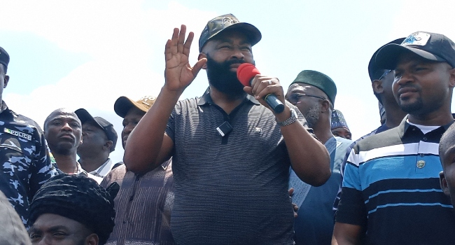 Niger State Governor Umaru Bago with flood victims in Mokwa, Niger State