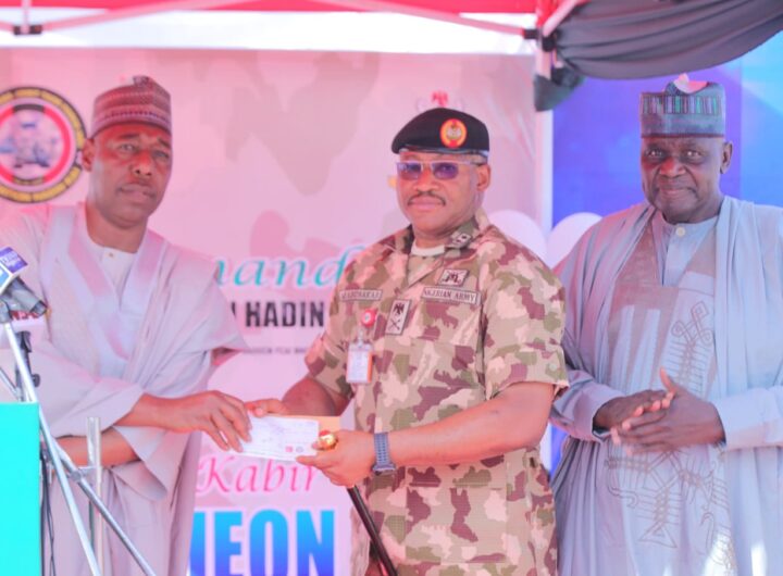 Borno State Governor Babagana Zulum presented a cheque of N100 million to the Theatre Commander of Operation Hadin Kai, Major General Abdussalam Abubakar, on Saturday at an Eid El-Kabir Sallah luncheon organized by the military in Maiduguri