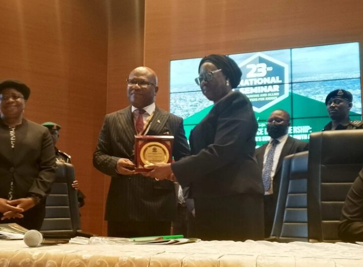 The President, Chartered Institute of Bankers of Nigeria (CIBN) presenting a plague to the Chief Justice of Nigeria, Justice Kudirat Kekere-Ekun at the 23rd National Seminar on Banking and Allied Matters for Judges in Abuja on Tuesday.