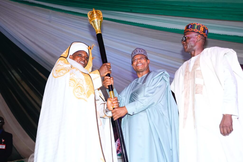 Kaduna State Governor, Uba Sani presenting the staff of office to Mr. Ishaku Tagwai Sambo, as the 5th Chief of Moro’a