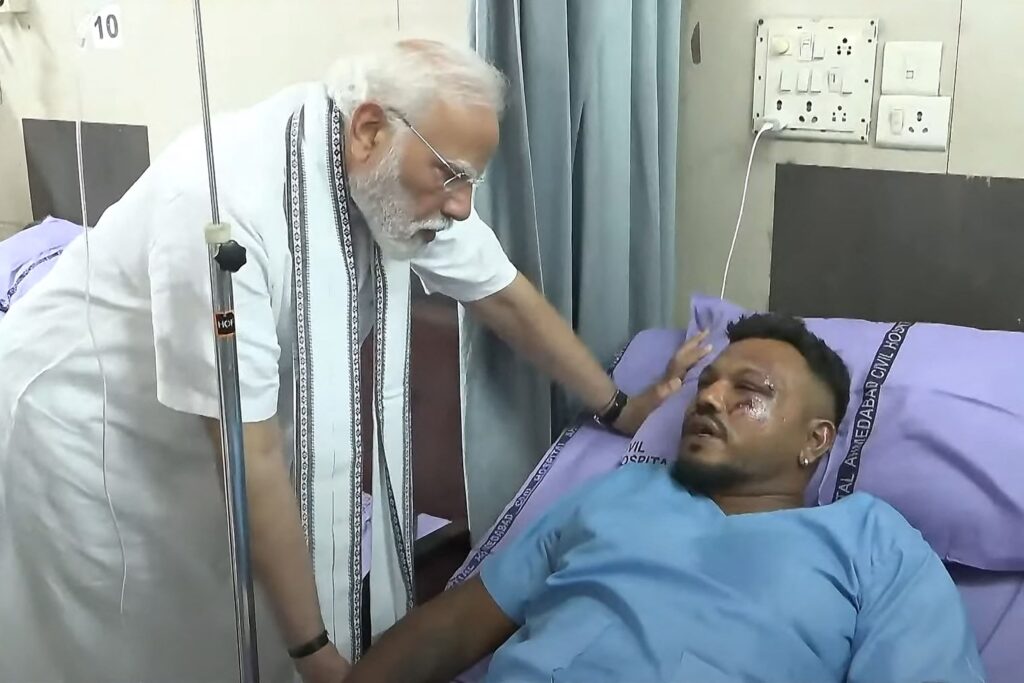 Air India plane crash sole survivor, Vishwashkumar Ramesh lying in hospital bed as he is visited by Indian Prime Minister, Minister Narendra