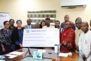 NSITF presents N18.6m cheque to family of deceased employee
