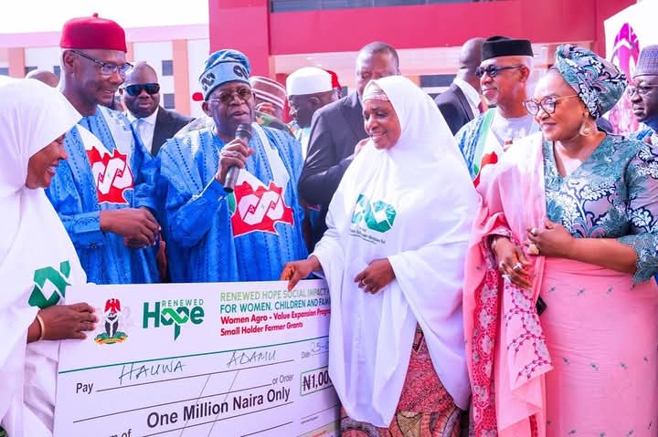 President Tinubu during a symbolic presentation of support to women as part of the Renewed Hope Social Impact Intervention