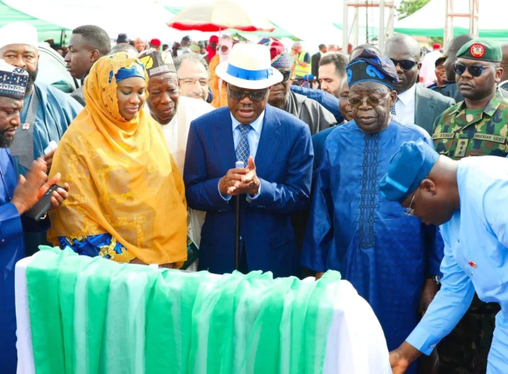President Bola Tinubu, FCT Minister, Nyesom Wike and FCT Minister of State, Mariya Mahmoud, during the road commissioning ceremony in Kwali Area council of Abuja