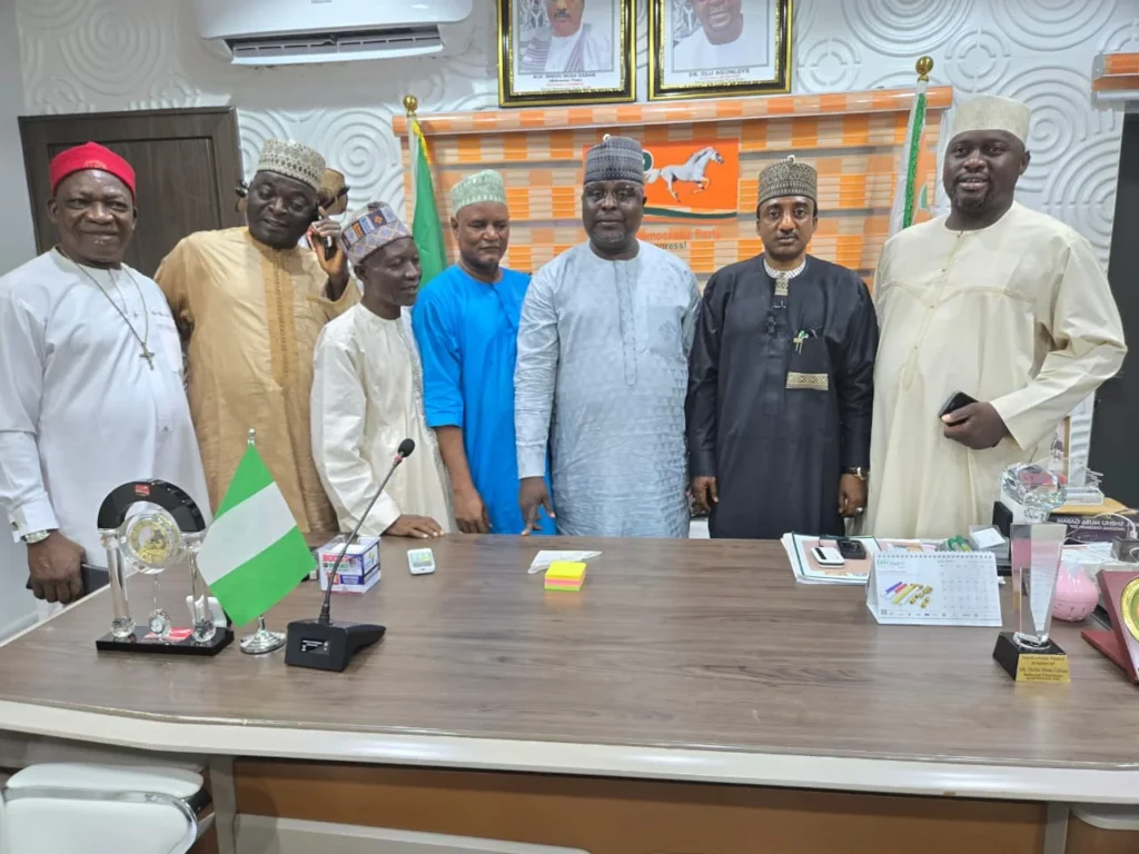 SDP National Chairman, Alhaji Shehu Gabam, flanked by some members of the party's National Working Committee (NWC) in Abuja