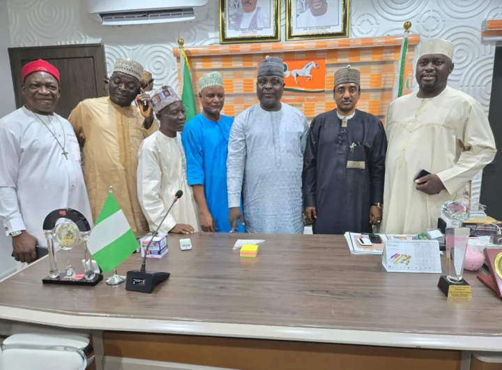 SDP National Chairman, Alhaji Shehu Gabam, flanked by some members of the party's National Working Committee (NWC) in Abuja