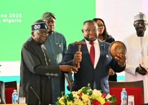 President Tinubu handing over ECOWAS leadership to Sierra Leone's President Maada Bio