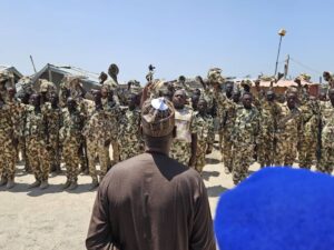 Borno State Governor, Babagana Zulum interfacing with military troops of 68 battalion headquarters in Malam-Fatori